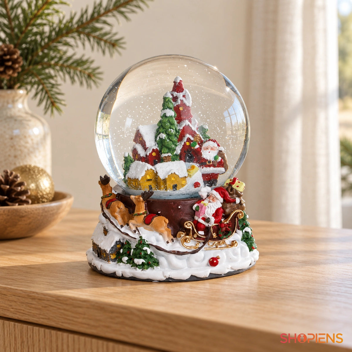 Glob cu căsuțe de turtă dulce, muzică și LED, 17 cm pe o consolă într-un decor luminos | Shopiens®