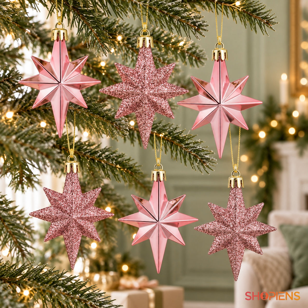 Stele roz alungite lucioase și cu glitter în decor de Crăciun – Shopiens